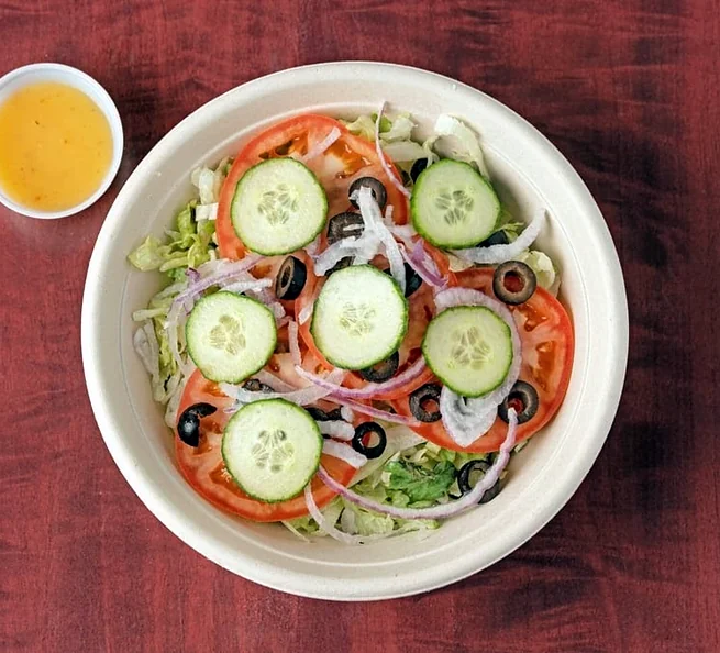 Garden salad with dressing on the side